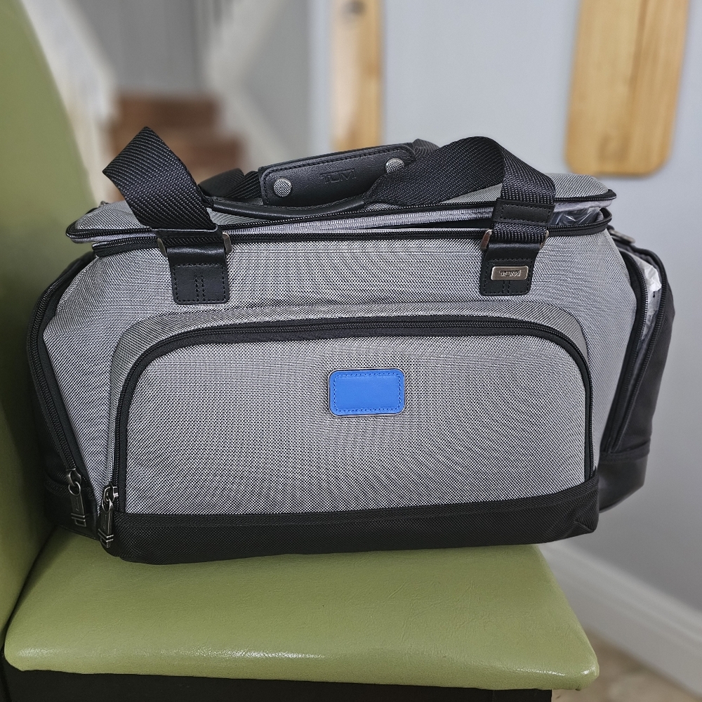BRAND NEW TUMI CHARGE DUFFLE